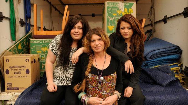 Denise Menashe and her daughters, Naomi (left) and Amy, have started a removals company  that specialises in moving people going through trauma.