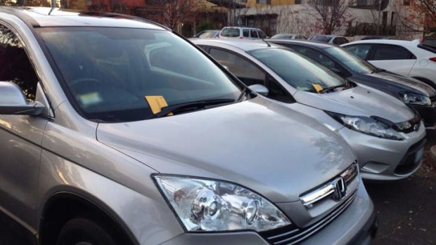 BOOKED: Some of the cars with infringement notices at Woden on Tuesday.