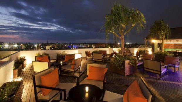 Sunset vista ... the cool, contemporary aesthetic of the Luna Rooftop Restaurant and Bar at L Hotel.