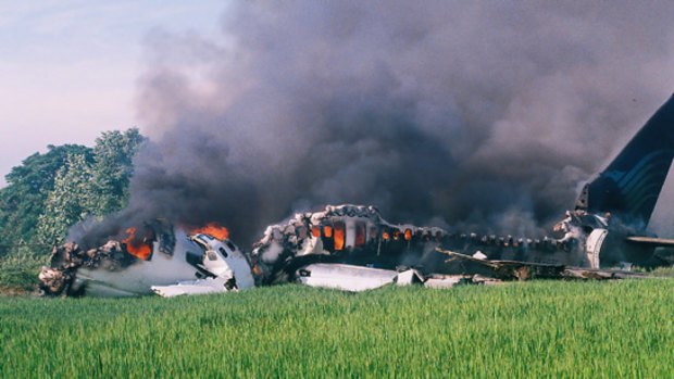 The burning wreckage of the Garuda Boeing 737.
