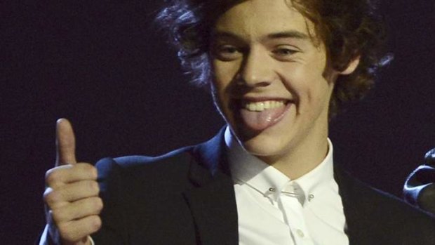 Laughing it off ... Villain Harry Styles of One Direction at the BRIT Awards 2013