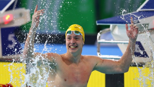 Daniel Tranter eggs on the Australian squad to cheer louder after his gold medal swim.