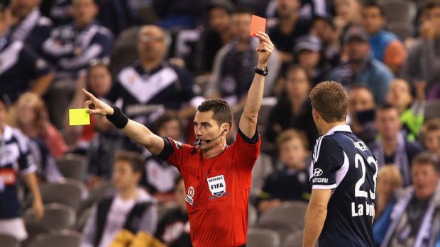 Farewell: Adrian Leijer is shown a second yellow card and then a red card after a tackle on Sergio Cirio.