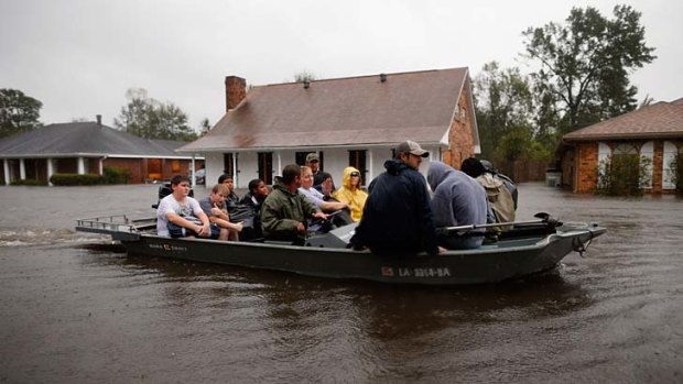 Residents are evacuated from LaPlace, north-west of New Orleans, in the wake of tropical storm Isaac.