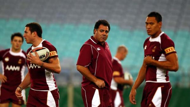Queensland coach Mal Meninga watches over a Maroons training session.