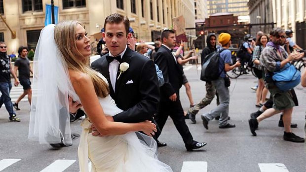 Newly-married couple Tim and Beth Alberts get caught in a protest in downtown Chicago.