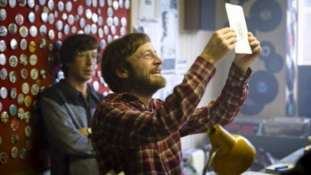 Bearded punk: Richard Dormer (right) plays record store and label owner Terri Hooley in <i>Good Vibrations</i>.