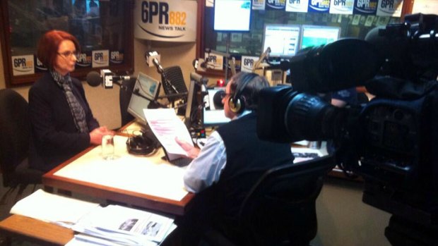 Former 6PR host Howard Sattler interviewing Julia Gillard in the studio.