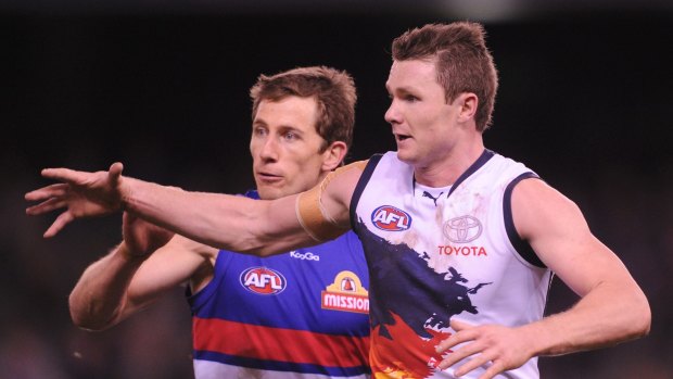 Patrick Dangerfield (right) could play his final game for the Crows against the Dogs.