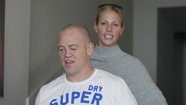 Toss scandal ... England captain Mike Tindall and wife Zara Phillips at the Rugby World Cup in New Zealand last year.