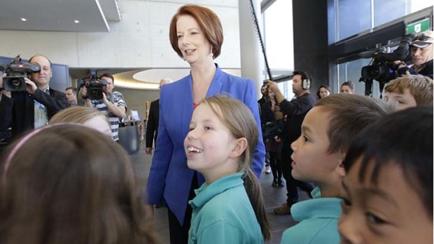 Prime Minister Julia Gillard met school students at the National Gallery of Australia before she addressed the National Press Club on school funding.