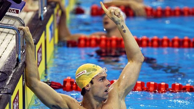 Eamon Sullivan celebrates winning the gold medal in the Men's 4 x 100 metres freestyle relay.