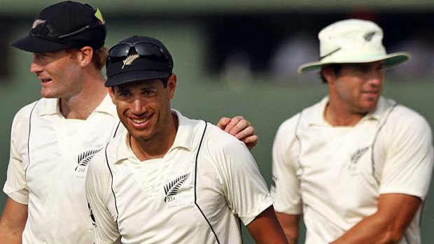 Public delight, private pain &#8230; Ross Taylor, centre, is all smiles after New Zealand won the second Test against Sri Lanka last month.