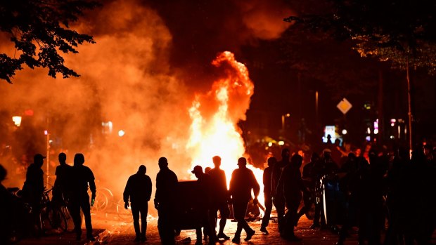 Protesters erect burning barricades during the "Welcome to Hell" protest march in Hamburg.