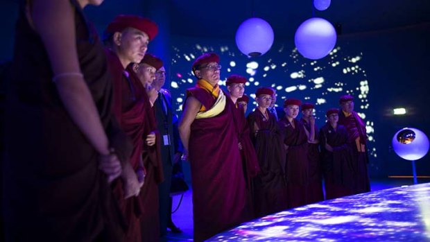 The 12th Gyalwang Drukpa, Jigme Pema Wangchen, along with Kung-Fu trained nuns visit the universe of particles exhibition at the European Organization for Nuclear Research (CERN) in Meyrin near Geneva.
