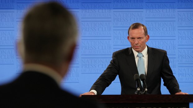 Prime Minister Tony Abbott takes a question from Channel 7's Mark Riley as he addresses the National Press Club.