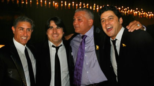 Working: Mick Gatto (second right) with actors Peter Barassi, Nick Giannopoulos and Vince Colosimo at the bushfire fund-raiser in April.
