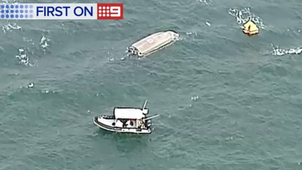 The boat which capsized in Moreton Bay, stranding six people.