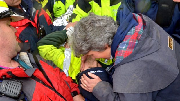 Luke Shambrook's mother Rachel kisses her son. 