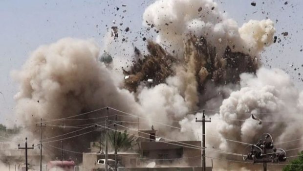 An image posted on a Sunni militant website shows a Shiite mosque in Mosul being destroyed, one of a series of shrines and mosques demolished by insurgents since they seized the northern Iraqi cities of Mosul and Tal Afar.