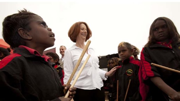 Julia Gillard with members of the Alice Springs childrens drumming group, Drum Atweme.