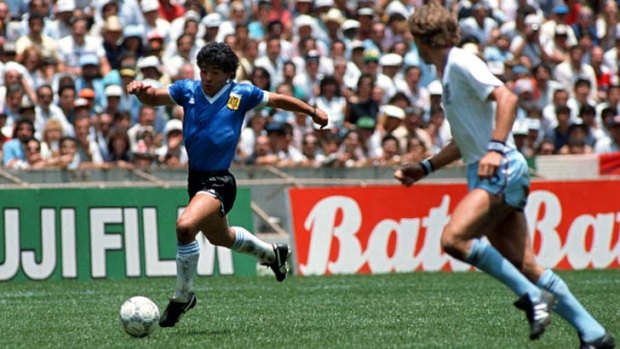Diego Maradona of Argentina torments England defenders during the World Cup quarter-final in 1986.