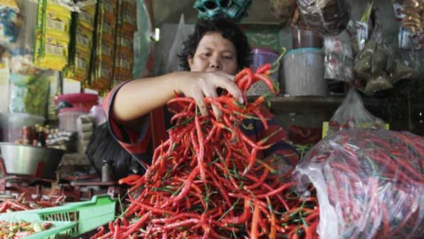 The price of chillies in Indonesia has quadrupled to $11 a kilogram, causing big problems in a nation of chilli lovers, many of whom live on about $2 a day.