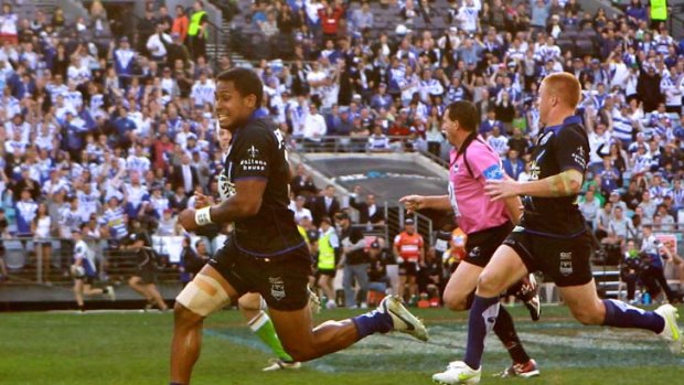 On the run ... Ben Barba from the Bulldogs makes his way to the try line.