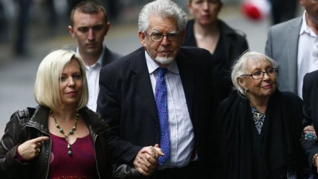 "Lapse of memory": Rolf Harris arrives at court with his daughter, Bindi, left, and wife, Alwen, in London.