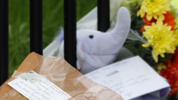 Tributes are left near the scene of a house in which  five children died in Derby.
