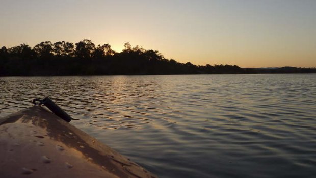 Sunset from my kayak on a secluded bay in Lake Burley Griffin.