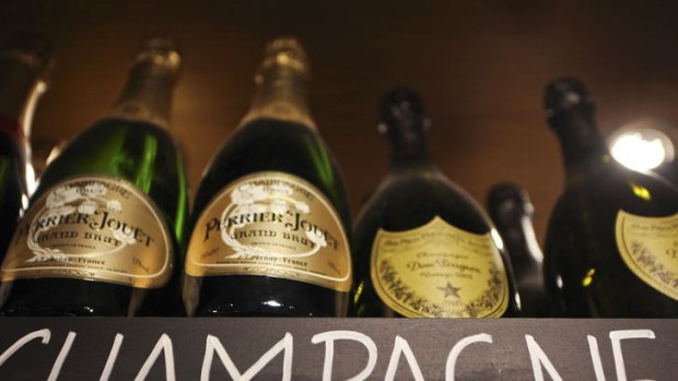 Bottles of Perrier Jouet and Dom Perignon champagne.