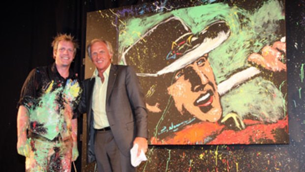 Artist Brian Olsen with Greg Norman and the amazing portrait.