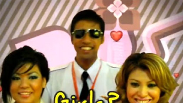 Girls ... just one reason to become a pilot, according to AirAsia's tongue-in-cheek blog video.