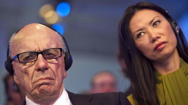 Rupert Murdoch and his wife Wendi Deng: Investors are taking news of their divorce calmly.