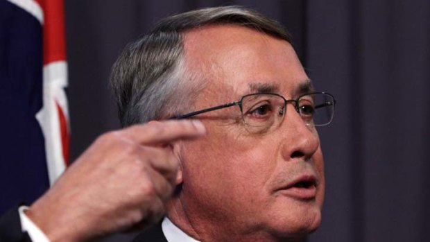 For my next trick &#8230; the Treasurer, Wayne Swan, yesterday, who faces an uphill battle to bring the budget back into the black.