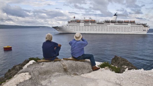 Amid the detainee debate, the Pacific Island cruise ship docks at Christmas Island.