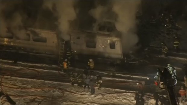 First responders battling a fire on a New York City-Metro-North train.