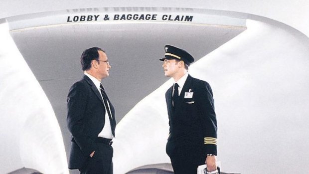 FBI Agent Carl Hanratty (Tom Hanks, left) and Frank Abagnale (Leonardo DiCaprio) engage in a game of cat and mouse in Catch Me If You Can.