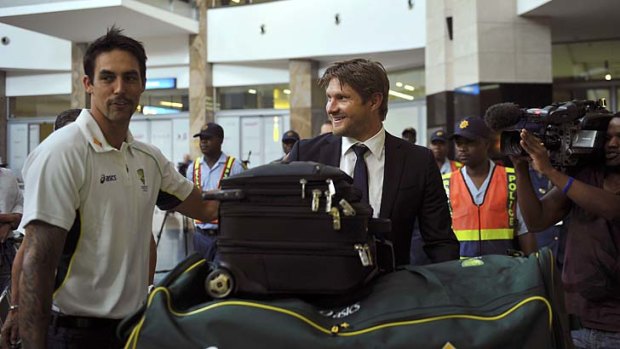 Mitchell Johnson and Shane Watson arrive at Johannesburg airport last Wednesday.