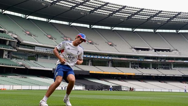 England captain Alastair Cook warms up at the Melbourne Cricket Ground.