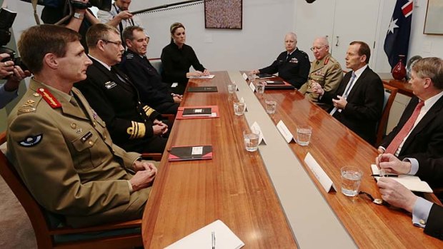 Border protection: Prime Minister-elect Tony Abbott meets with defence chiefs, including Major-General Angus Campbell (left).