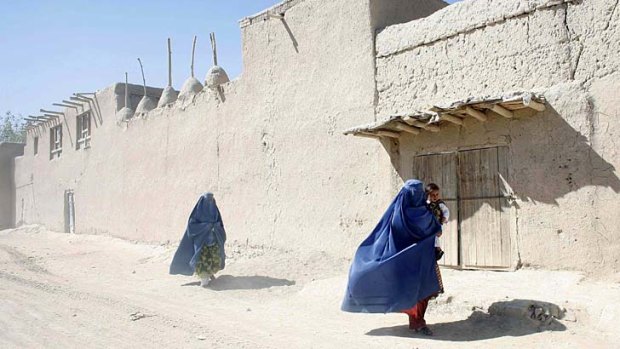 Cleaning up the streets: Women in Logar province.