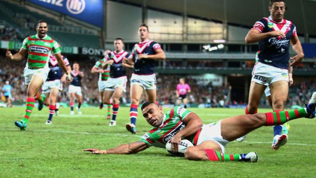 First blood: Nathan Merritt goes over for South Sydney in the Rabbitohs' 28-10 win over their old foes in round one.
