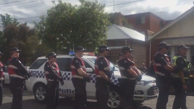 Police attempt to remove squatters from Bendigo Street, Collingwood