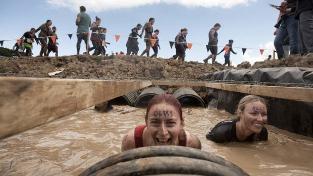 In deep: Competitors in the Tough Mudder event at Phillip Island.
