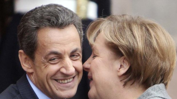 Pressure ... Nicolas Sarkozy and Angela Merkel.