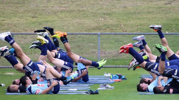 Leg work: Sydney FC players stretch their legs at training on Friday before flying to Perth to take on the Glory.