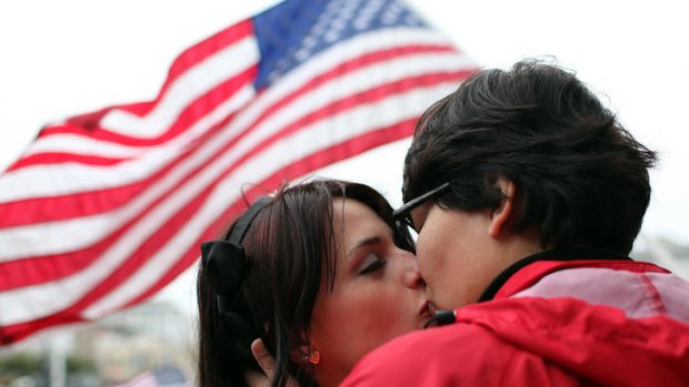 One step closer to marriage ... same-sex couple Breana Hansen (L) and Monica Chacon kiss as they celebrate outside of San Francisco City Hall.