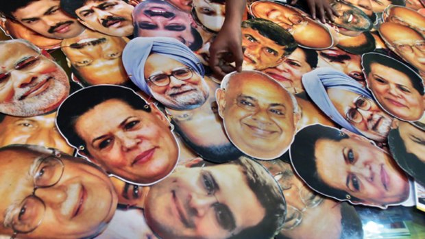 Masks of Indian politicians at a printing firm in Bangalore, including (clockwise from left) BJP leader L. K. Advani,  Congress leader Sonia Gandhi, Prime Minister Manmohan Singh, former prime minister H. D. Deve Gowda and Sonia Gandhi's son Rahul. 